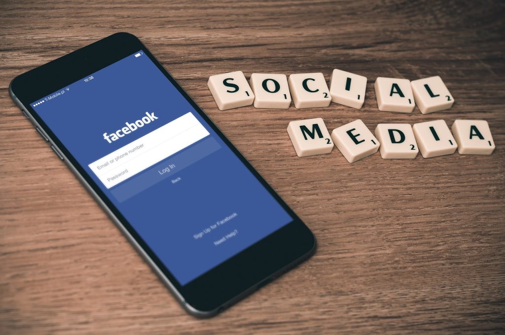 hair unit specialist scrolling social media on smartphone